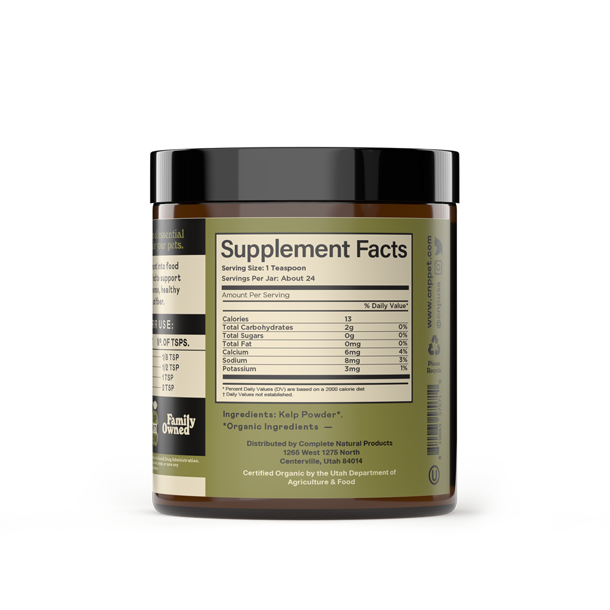 A brown glass jar with a black lid from CNP Pet displays the Organic Kelp Powder Supplement for Dogs & Cats. The label highlights amino acids, nutrition info, directions for use, and distributor details on the back.