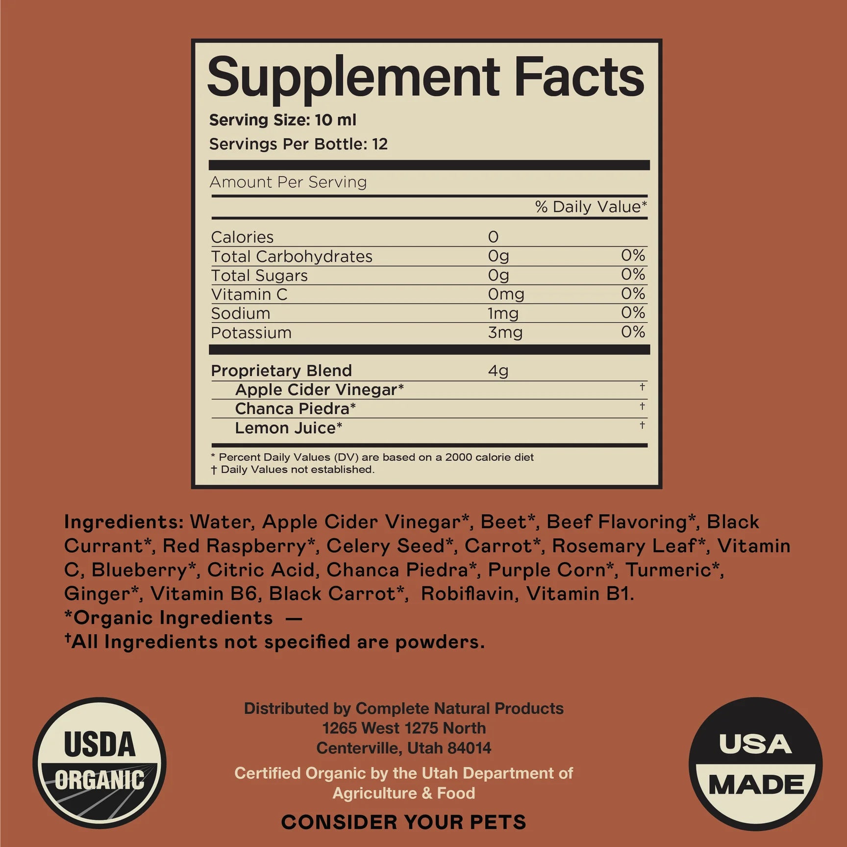 Supplement facts label for a pet product, listing ingredients like apple cider vinegar, beet, celery seed, vitamins, and turmeric. Labels for USDA Organic and USA Made appear at the bottom alongside distributor information.